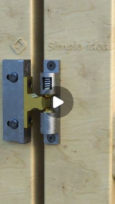 a close up of a wooden door with a lock on the front and back side