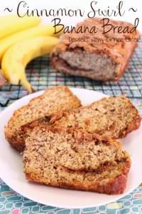 banana bread on a plate next to some bananas