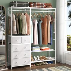 an open closet with clothes and shoes on it