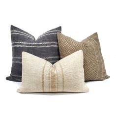 four pillows with different colors and patterns on them