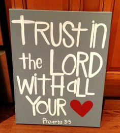 a sign that says trust in the lord with all your heart