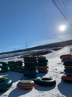 the snow is piled high and ready to be used for tubing in the winter