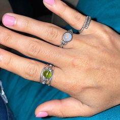 Please note, this is a WIRE and BEAD ring. It is made with sterling silver wire, and a genuine Moldavite bead. The higher price for this ring is due to it being made with genuine Czech Moldavite, which I have invested in a very limited supply of. I am almost out of stock, so the price will reflect that. I hope to find more in the future, and will adjust the price accordingly to my supply :) This ring is uniquely hand-crafted with 22 gauge sterling silver round wire, 4x5mm sterling silver Bali be Sterling Silver Wire Wrap, Cabochon Ring, Ring Pictures, Beaded Rings, Wrapped Pendant, Wire Wrapped Pendant, Silver Wire, Round Beads, Wire Wrapped