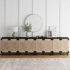 a modern sideboard with black trim and wood panels