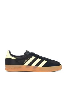 Find ADIDAS ORIGINALS BY ALEXANDER WANG Gazelle Indoor In Black on Editorialist. adidas Originals Gazelle Indoor in Black Suede, leather, and mesh upper with rubber gum sole. Made in Vietnam. Lace-up front. Signature three stripes at side panels. Gold-tone printed Gazelle logo at outer panel. Padded low-cut leather collar with contrast back counter and Adidas logo. ADIO-MZ157. IG4999. About the designer: April Inspiration, Adidas Originals Gazelle, Summer Uniform, Capsule Wardrobe Essentials, Leather Collar, Clean Girl, Adidas Logo, Side Panels, Panel Siding