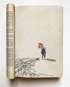 an open book with a drawing of a child on it