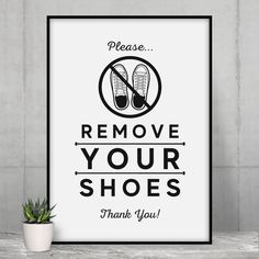 a sign that says, remove your shoes thank you