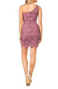 This full-of-romance mini is crafted in lovely floral lace with a sweet shoulder-baring silhouette. 32 1/2" length One-shoulder neck Lined 100% polyester Machine wash, dry flat Imported Lace Fabric Dress, Fitted Mini Skirt, Glamorous Gowns, Shop Dress, Black Sheath Dress, Midi Sheath Dress, Dress The Population, Lace Dress Black, Cocktail Dress Lace