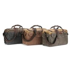 Waterproof Waxed Canvas Travel Duffle Bag Waxed Finish Satchel Canvas Bag For Travel, Waxed Finish Canvas Satchel For Travel, Waxed Finish Canvas Travel Satchel, Waxed Finish Rectangular Canvas Travel Bag, Canvas Satchel With Luggage Sleeve For Overnight Trips, Travel Duffle Bag With Waxed Canvas Finish, Functional Waxed Canvas Travel Bag For Daily Use, Canvas Weekender Bag With Waxed Finish For Overnight Trips, Brown Waxed Canvas Rectangular Duffle Bag