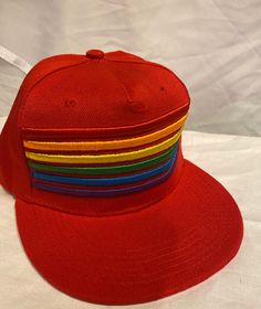 LGBT Rainbow Pride Snap Back Hat with flat brim Red hat with embroidered rainbow stripes Show your PRIDE with this stylish snap back hat. Perfect for everyday wear The rainbow stripes are beautifully embroidered and are 3D This hat is adjustable 😄 Free shipping! Casual Striped Adjustable Baseball Cap, Adjustable Striped Baseball Cap, Multicolor Snapback Baseball Cap, Retro Red Adjustable Snapback Hat, Trendy Multicolor Flat Brim Baseball Cap, Casual Adjustable Rainbow Hat, Retro Multicolor Snapback Baseball Cap, Trendy Multicolor Snapback Hat With Flat Brim, Trendy Red Snapback Hat With Flat Bill