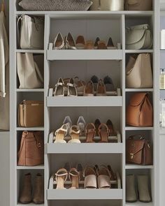 a white closet filled with lots of different types of shoes and purses on shelves