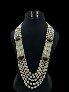 Very Gorgeous and elegant Polki stone Necklace  Versatile. Can be paired with number of outfits. Perfect to wear at weddings occasions. Highest quality and craftsmanship Please let me know if you have any questions