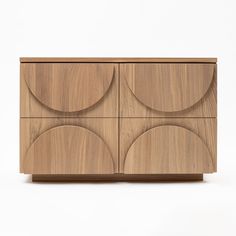 the sideboard is made out of wood and has circles on it