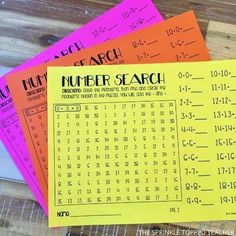 three numbers search cards sitting on top of a wooden table