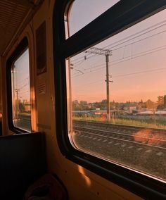 the view from inside a passenger train looking out the window