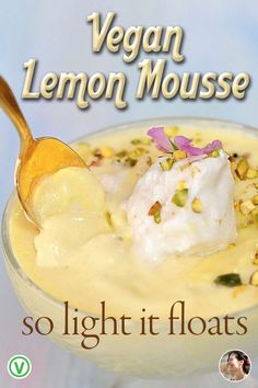 there is a dessert in the bowl with a spoon on it that says, vegan lemon mousse so light it floats