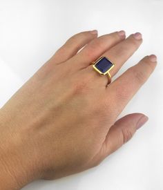 This beautiful bezel set ring is made with large rectangular faceted natural Blue Jade in 18K Vermeil Gold. The ring has a 925 stamp. Gemstone size is 13 x 18 mm. Please specify your size at checkout. Since I use natural gemstones, the stones may vary slightly in color, shape and size. Due to the nature of this stone there are natural inclusions and small internal cracks. This ring is available in two finishes: ✦ 18K VERMEIL GOLD ✦ BRIGHT STERLING SILVER Please leave me a note at checkout which Yellow Gold Emerald Ring With Rectangular Stone For Gift, Rectangular Emerald Ring Fine Jewelry Gift, Rectangular 14k Gold Emerald Ring As Gift, Rectangular Gold Emerald Ring With Bezel Setting, 14k Gold Rectangular Emerald Ring Gift, Gift Emerald Ring With Rectangular Stone, Gold Rings With Rectangular Gemstone, Gold Sapphire Ring With Rectangular Stone As Gift, Rectangular Emerald Ring As A Gift