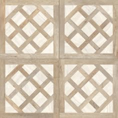 four wooden squares with white and brown patterns