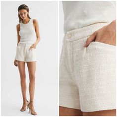 The Cream Patrizia Shorts Are A Lightweight Option For Warm-Weather Styling. They’re Crafted From A Cotton-Blend With A Textured Feel, And They Sit High-Rise On The Frame. Pair With The Coordinating Jacket And High Heels For A Heritage Look. Or, Keep It Casual By Tucking In A Vest And Wearing Flats. Cotton Blend. Textured Fabrication. High Rise. Zip Fly And Button Closure. Side Slip Pockets. 93% Cotton, 7% Nylon. Smoke Free Home Bin F Elegant Beige Bottoms With Short Inseam, Elegant Beige Shorts With Short Inseam, Elegant Short Inseam Summer Pants, Elegant Cream Shorts For Spring, Elegant Short Pants For Summer, Elegant Fitted Cream Shorts, Elegant Beige Shorts, Elegant Beige Short Pants, Elegant Cream Spring Shorts