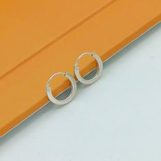 IMPORTANT **Please go through all the pictures i have posted for a listing with a ruler, on a model, on my hand, to get an exact idea of the actual size of the item. Sterling silver 10mm huggie ear hoops. Dimensions: 1.2 x 10mm Price listed is for a PAIR of hoops. These earrings are made of 925 hypoallergenic sterling silver. Most of my pieces come with a 925 stamp. Can be packaged in a gift box. I can include a personal message from you if needed You are welcome to contact me at... bhavnakwintr Minimalist Nickel-free Small Hoop Huggie Earrings, Minimalist Hoop Huggie Earrings With Simple Design, Simple Hoop Huggie Earrings For Everyday, Simple Small Hoop Earrings For Pierced Ears, Nickel-free Minimalist Hoop Huggie Earrings, Simple Nickel Free Small Hoop Huggie Earrings, Minimalist Small Hoop Nickel-free Earrings, Simple Nickel-free Hoop Huggie Earrings, Simple Small Hoop Hypoallergenic Earrings