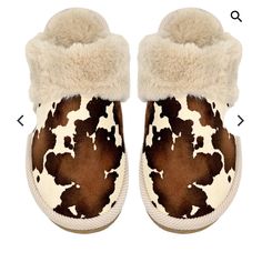 Get The Best Of Both Worlds With Our Cow Print Faux Fur C.C Slippers! Keep Your Feet Cozy And Make A Playful Statement With These Slippers Featuring A Fun Cow Print Design. Treat Yourself Or Give As A Unique And Fun Gift For Any Occasion. Step Into Comfort And Style Today! Available In 2 Sizes: Small/Medium: Women's Standard Size 6-8 Medium/Large: Women's Standard Size 8-10 Cow Slippers, Cc Beanie, Buckles Fashion, Winter Slippers, Faux Fur Slippers, Fur Slippers, Horse Jewelry, Slippers Cozy, Winter Essentials