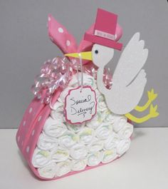 a stork baby shower cake with its name on it