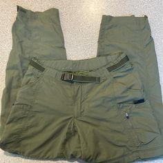 Rei Lightweight Convertible Hiker Pants/ Shorts With Zipper, Ankle Zip, And Velcro Adjustment. Nylon. Snap And Hidden Zipper Pockets For Storing Hiking Essentials. Outdoor Khaki Pants With Built-in Shorts, Utility Pants With Built-in Shorts For Outdoor Activities, Utility Pants With Built-in Shorts For Outdoor, Khaki Outdoor Pants With Built-in Shorts, Green Cargo Bottoms For Hiking, Green Cargo Pants With Belt Loops For Outdoor Activities, Green Cargo Pants With Belt Loops For Outdoor, Hiking Essentials, Hidden Zipper