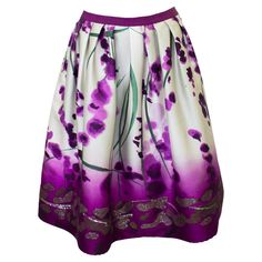 Late 90s Oscar de la Renta silk blend skirt featuring a beautiful watercolor printed purple floral pattern and finished with a sequin adorned hem. The skirt goes from light to dark at the hem and flares out from the waist. In excellent condition, Marked a US 8 and fits like a US 6. Zips at the side and hidden hip pockets. Waist 29" Hips 48" Length 23" Spring Silk Skirt With Floral Print, Silk Full Skirt For Spring, Full Silk Skirt For Spring, Floral Print Flowy Evening Skirt, Spring Party Skirt In Purple, Flowy Floral Print Evening Skirt, Evening Floral Print Flowy Skirt, Evening Flowy Floral Print Skirt, Silk Full Skirt With Floral Print