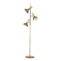 the three light floor lamp is gold and has three shades on each side, one with two