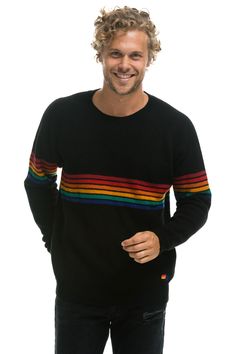 Our luxury take on our classic stripe crew sweatshirt taking cozy to a whole new level. Made of 12GG cashmere jersey making it the perfect weight to be an every day staple. The sleeves were intentionally made on the longer side to make it extra snuggly. Pair it with the matching joggers or throw it on with your favorit Casual Black Sweater With Striped Cuffs, Winter Crew Neck Sweater With Striped Sleeves, Winter Sweater With Striped Sleeves And Crew Neck, Black Crew Neck Top With Signature Stripes, Black Casual Sweater With Contrast Stripes, Black Sweater With Striped Sleeves For Winter, Casual Black Sweater With Contrast Stripes, Casual Sweatshirt With Signature Stripes And Crew Neck, Fall Crew Neck Top With Signature Stripes