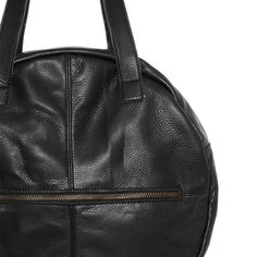 Stylish black round leather bag handmade in our atelier with soft and lightweight natural leather. Two handles for wearing it on the shoulder or by hand. Top closure by zip. With zippered pockets inside and outside. Big enough to carry a lot of things in your everyday life. Lined in cotton. ##MEASURES: Diameter: Width: 13,8 inches/35 centimeters. Depth: 2,8 inches/7 centimeters. Handles Leight: 25 inches/ 65 centimeters. width of the handles: 1 inch / 2.5 centimeters ##DETAILS: Name: LP. Made in Modern Bags With Leather Lining And Round Handle, Modern Bags With Round Handle And Leather Lining, Modern Bag With Round Handle And Leather Lining, Chic Round Bags For Daily Use, Chic Round Bag For Daily Use, Versatile Round Case Travel Bag, Modern Round Case Travel Bag, Black Bag With Removable Pouch And Round Case, Black Bags With Removable Pouch Round Case