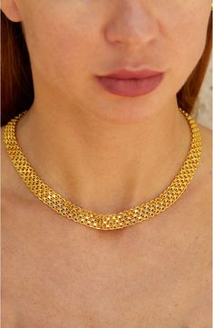 Metalmesh shapes a bold collar necklace that is plated with luxurious 18K yellow gold. 16" chain length with 3" extension Lobster clasp 18K yellow gold plated brass Imported Gold Bib Necklace As A Gift, Gold Bib Necklace With Chain For Gift, Simple Gold Necklace Designs, Yellow Statement Necklace, Classic Jewellery, Unique Gold Jewelry Designs, Locket Design, Gold Bridal Necklace, Modern Gold Jewelry