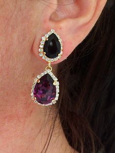 "Purple amethyst black crystal earrings, Chandelier earring, Drop earring, Dangle earring, Bridal earring, Bridesmaids gifts, Gold or silver, Rhinestone earrings, Weddings Beauty with Statement. These stunning earrings have a great statement look that can't be missed. They would be great bridal earrings or with an evening dress. They are made of 14k gold plated brass posts, Swarovski crystals , all set in prong setting. Made with CRYSTALLIZED™ - High quality genuine Swarovski Elements Purple and Elegant Purple Dangle Chandelier Earrings, Unique Purple Jeweled Dangle Jewelry, Purple Drop Chandelier Earrings For Formal Occasions, Elegant Purple Crystal Earrings For Evening, Purple Crystal Drop Earrings For Evening, Purple Crystal Jeweled Earrings, Purple Drop Crystal Earrings For Evening, Purple Jeweled Drop Earrings, Purple Jeweled Crystal Earrings