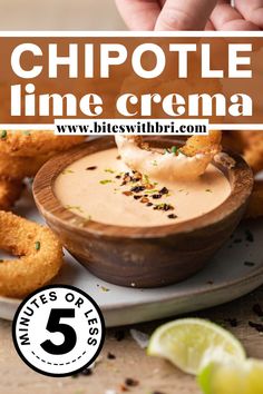 a person dipping sauce into a bowl with onion rings on the side and text overlay reading chipotle line crema