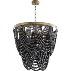 a chandelier with beads hanging from it's metal frame and wooden accents