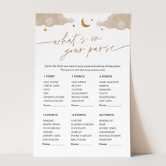 a white and gold wedding seating chart with clouds, stars and the words what's in your purse on it