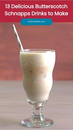 a glass filled with milk sitting on top of a table