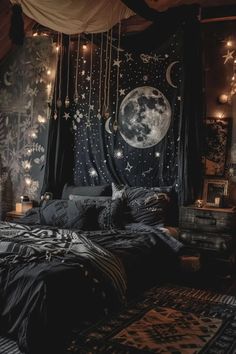 a bed room with a large window covered in stars and moon decorations on the wall