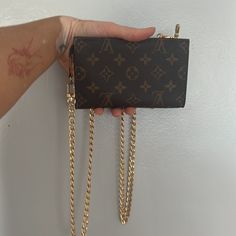 Authentic Has A Ring On One Side 7” W 4.5” L Peeled The Sticky Part Please See Video For Conditions Add Chain And Use It A Belt Bag Chain Not Included- It’s An After Market You Can Buy It On Amazon Fake Louis Vuitton Key Pouch, Mini Pochette Accessories, Lv Keychain Pouch, Louis Vuitton Wallet On Chain, Pochette Accessories, Louis Vuitton Mini Pochette, Louis Vuitton Key Pouch, Louis Vuitton Mini, Louis Vuttion Key Pouch