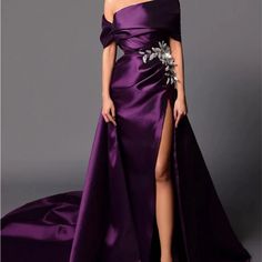 Formal Gown. Never Worn. Bride Changed Her Mind. Dress Is Pretty. The Actual Appliqu Is A Little Different On The Dress Purple One-shoulder Gown For Wedding, Purple One-shoulder Dress For Banquet, Purple One-shoulder Dress For Wedding, Purple Gown With Sweep Train For Banquet, Purple Floor-length Maxi Dress For Banquet, Purple Maxi Length Gown For Banquet, Purple Satin Floor-length Gown, Purple Maxi Gown For Evening, Purple Maxi Length Evening Gown