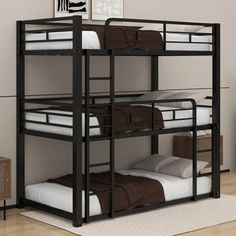 the bunk bed is black and has two sets of mattresses on top of it