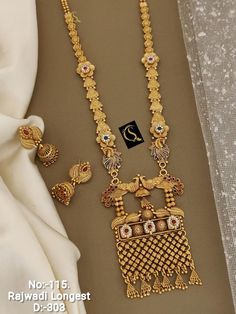 Description :- South Indian Jewellery Set /Temple Jewelry Set /Choker Necklace / Choker Set/ Bollywood Jewelry/ Indian Jewelry/ Gifts Perfect for Indian weddings. All the raw material used in this product is of high quality and is handcrafted with love. Premium Quality and High craftsmanship 100% Satisfaction Guarantee: Long Lasting Plating, High-Quality Stones. Gifting: This pair of charming necklace and earrings come in a beautiful gift box, making it an ideal gift for birthday, wedding annive Golden Set Jewellery Design, Indian Jewellery Set, Unique Gold Jewelry Designs, Mangalsutra Design, Black Beads Mangalsutra, Black Beads Mangalsutra Design, Temple Jewelry, Emoji Photo, Gold Bridal Jewellery Sets