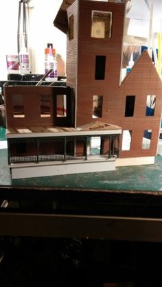 a model house sitting on top of a table