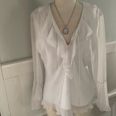 Vintage Y2k Silky White Fitted Blouse. Never Worn! (Measurements Included In Info) Delicately Patterned With A Subtle And Classy Design In White Complimenting The Bright White Layered Blouse With Flowing Bell Sleeves And Fitted At Waist. Gorgeous And Flowy Bell Style Sleeves. Very Silky Feel And So Airy And Comfortable While Keeping Everything Hidden Despite White Color. So Soft And Feminine. Very Current And Trendy. Size Medium But Can Fit Small As It’s Vintage. Perfect Day To Night Wear! Great Flowy Top Aesthetic, White Victorian Blouse, Flowy Sleeves Top, White Ruffled Blouse, Blouse Outfit Aesthetic, White Blouse Outfit Classy, White Pirate Shirt, Flowy Blouse Outfit, Ruffle Shirt Outfit