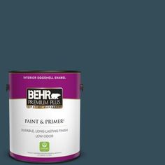 a blue paint can with the words behr premium plus painted on it's side