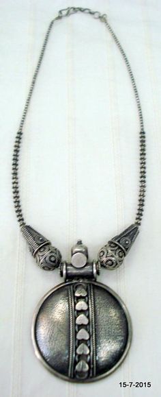 Vintage Antique tribal old silver necklace from Rajasthan India. Great handmade design, good for jewellery collection.heart. paLength - 46 cm (18.1") we can adjust the length.pendant size max. - 7.4/5 cm (2.9/1.96")weight - 66.5 grams material - silver. Antique Finish Silver Temple Necklace As Gift, Silver Temple Necklace With Antique Finish As Gift, Antique Oxidized Silver Necklace, Antique Silver Engraved Necklace For Rituals, Vintage Silver Necklaces For Rituals, Heavy Antique Silver Necklace, Antique Silver Necklace For Festivals, Antique Silver Metal Necklaces For Rituals, Silver Locket Necklaces For Rituals