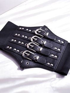 Enhance your edgy and gothic look with this black gothic punk corset belt. Crafted with high-quality materials, this corset belt features a sleek black design with punk-inspired details. Perfect for adding a bold and striking accent to any outfit, this versatile accessory can be paired with a variety of tops and dresses.  Please note that this product includes only the corset belt.  Garment Size   	 		 			Size 			Free Size 		 		 			Width 			12-19 		 		 			Waist 			68-80 Gothic Corset With Belt For Cosplay, Black Punk Corset For Alternative Fashion, Black Gothic Corset For Club Wear, Gothic Black Corset For Club, Black Gothic Corset For Club, Black Party Corset With Belt, Black Gothic Corset With Belt, Gothic Corset Belt For Party, Black Punk Belt With Rivets