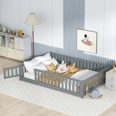 a baby's room with a crib, dresser and stuffed animals on the floor