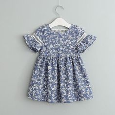 Floral Dress for Toddler Girl - PrettyKid Short Sleeve Cotton Dress For Dress-up, Blue Cotton Dress For Dress-up, Cotton Short Sleeve Sundress For Spring, Cotton Sundress With Short Sleeves For Spring, Spring Cotton Sundress With Short Sleeves, Blue Cotton Floral Dress For Summer, Light Blue Cotton Sundress For Spring, Blue Cotton Floral Summer Dress, Summer Blue Cotton Floral Dress