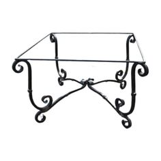 wrought iron shelf with glass top